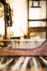 Closeup image of an old weaving Loom