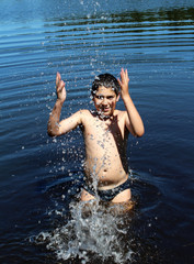 Fototapeta premium boy swims