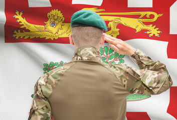 Soldier saluting to Canadial province flag conceptual series - Prince Edward Island