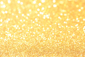 gold and white bokeh lights defocused. abstract background