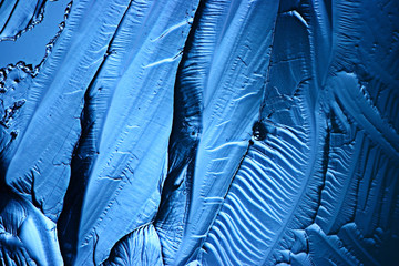 abstract blue background cold ice texture with cracks