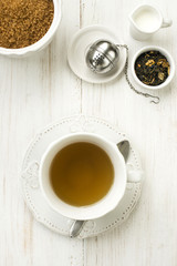 cup of tea with milk and sugar