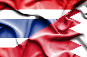 Obraz premium Waving flag of Bahrain and Thailand