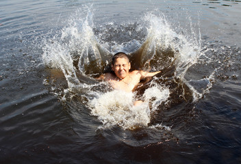 A boy swims