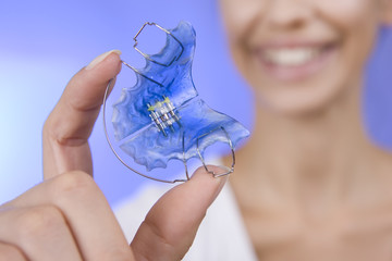 Beautiful Smiling Girl with Retainer for Teeth, Close-up