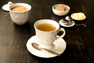 cup of tea with lemon and sugar