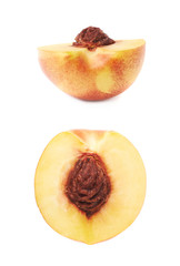 Cut open nectarine half isolated