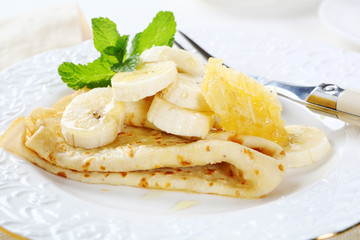 Pancakes on a white plate