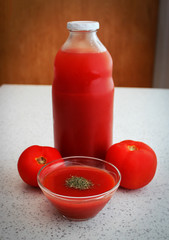 Tomato juice and fresh tomatoes