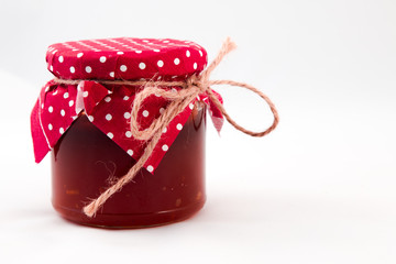 Strawberry jam and fresh berries isolated on white