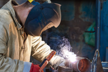 Welder busy parts of the pipeline