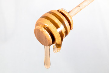 Honey drip isolated on white background