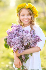 portrait of little girl outdoors in summer