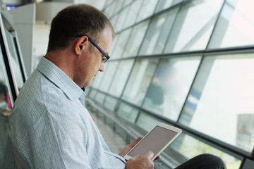 elegant business man with tablet