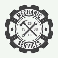 Vintage mechanic label, emblem and logo. Vector illustration