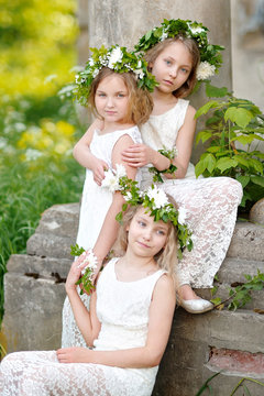 portrait of three girls in a wedding style