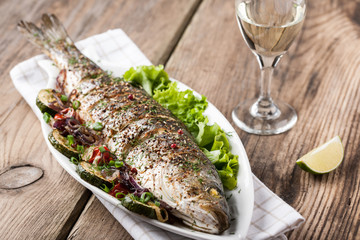 Baked fish with vegetables