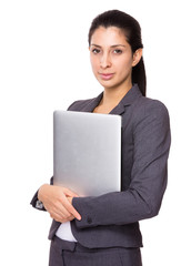 Indian businesswoman holding with notebook computer