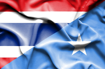 Waving flag of Somalia and Thailand