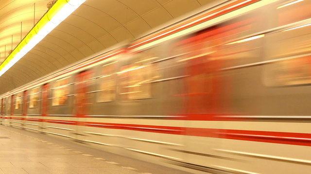 Subway Train with Passengers Arriving to Underground Metro Station, Motion Blur