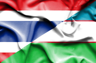 Waving flag of Uzbekistan and Thailand