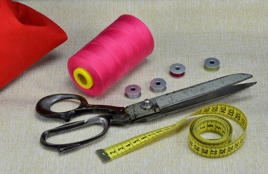 Old scissors, buttons, threads, sewing thread