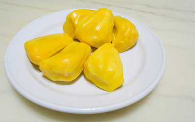 Fresh ripe Jackfruit in the bowl on the marble background