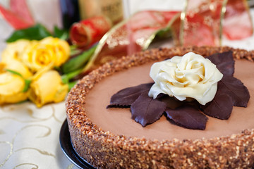 Pure dark chocolate cake with white eatable rose
