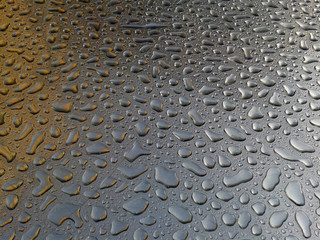 water droplets on a steel surface