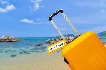 Let`s Travel !. suitcase with label.