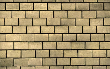 Texture of yellow decorative tiles in form of brick