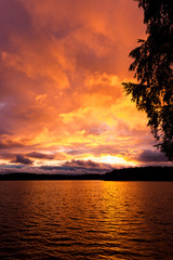 Dramatic red sunset over a lake