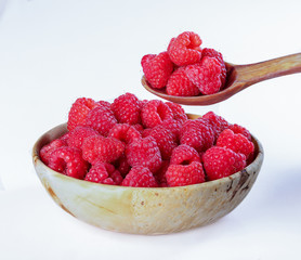 raspberries in a wooden bowl