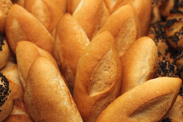  roll bread with sesame and poppy seeds in a restaurant.