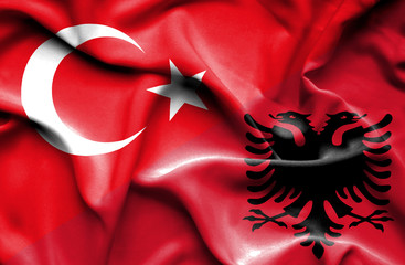 Waving flag of Albania and Turkey