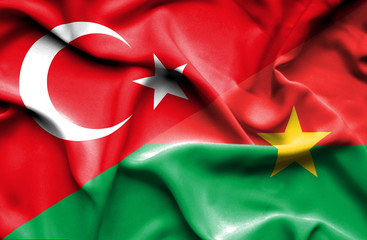 Waving flag of Burkina Faso and Turkey