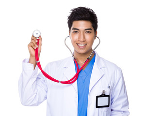 Doctor holding up with stethoscope
