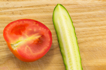 Cucumber and tomato with measuring