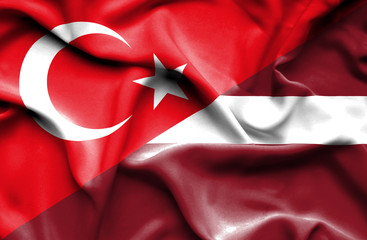 Waving flag of Latvia and Turkey