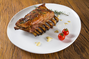 Raw meat selection on wooden cutting board with knife