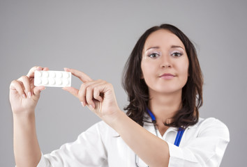 Medical Concept: Professional Female Caucasian Doctor Holding an