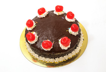Chocolate cake with red cheery