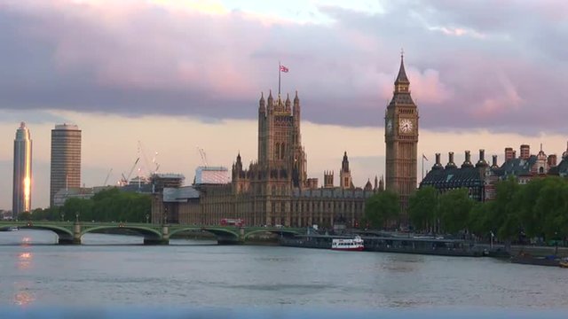 Skyline of Westminster bridge and Palace with Big Ben Clock Tower on sunset London UK