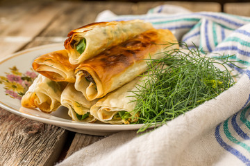 Plate of many mini bite size sandwich appetizers