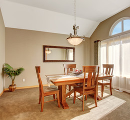 Traditional dinning room with carpet, in beautiful northwest hom