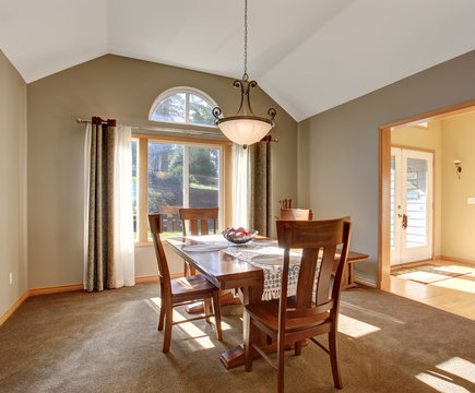 Traditional dinning room with carpet, in beautiful northwest hom
