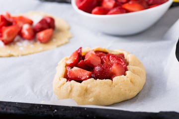 Raw rustic strawberry galettes