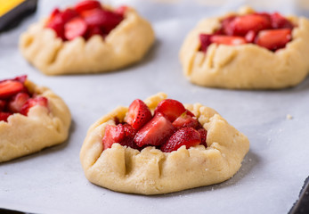 Raw rustic strawberry galettes