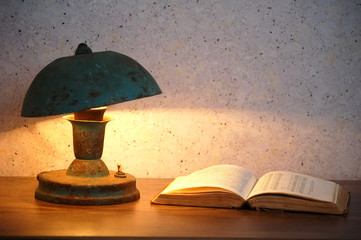 Old lamp and book