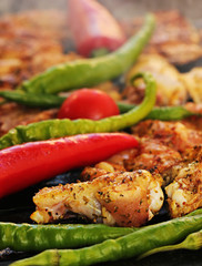 Grilled chicken on the grill